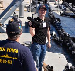 Tom on the bow of the Iowa